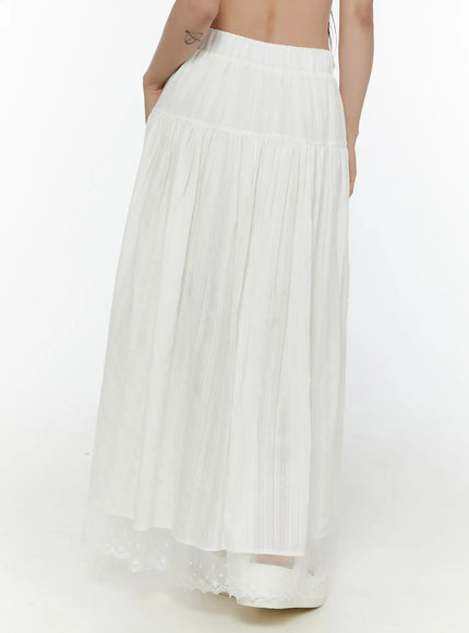 Lace Flared Maxi Skirt CL507 white back shot on model showing gathered tiered skirt with lace hem trim styled with olive cami top