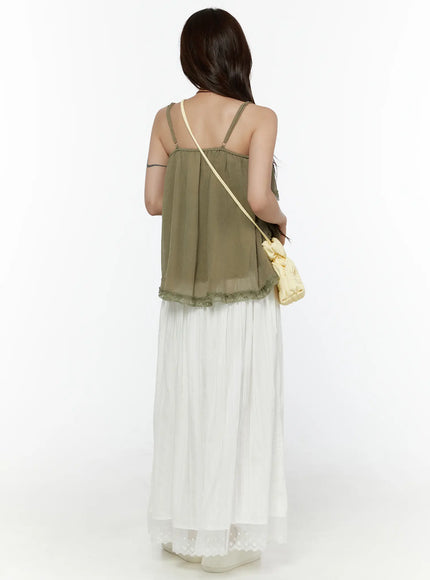Lace Flared Maxi Skirt CL507 white back three-quarter shot on model showing elastic waistband gathered tiers and sheer embroidered lace hem