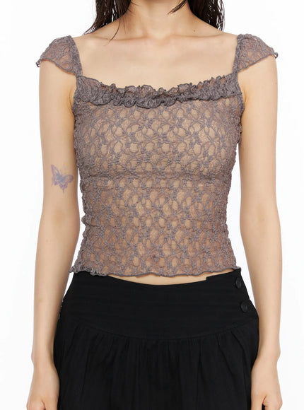 Lace Frill Sleeveless Top CU530 Dark gray close-up front detail on model showing ruffle trim neckline and semi-sheer lace fabric texture