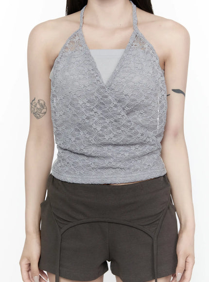 Lace Halter-Neck Top IL522 Gray close-up front shot showing gray floral lace wrap V-neckline halter top with inner lining detail and dark shorts waistband