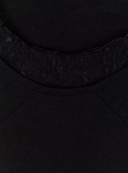 Lace Halter Tee IU525 Black close-up detail shot of black floral lace U-neckline trim and empire seam stitching on black jersey fabric