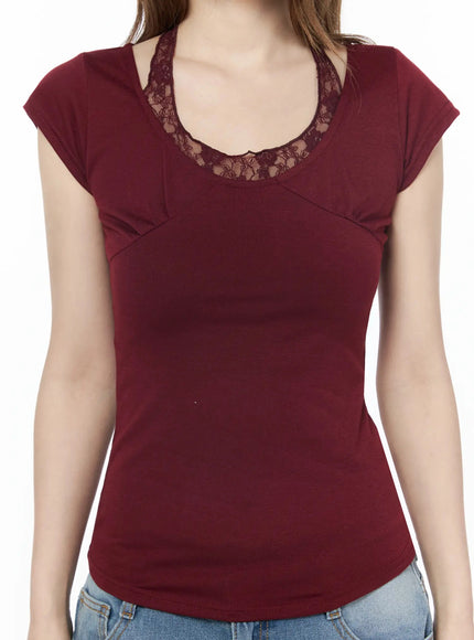 Lace Halter Tee IU525 Dark red close-up front shot on model torso showing floral lace U-neckline trim and seam detail, cap sleeves