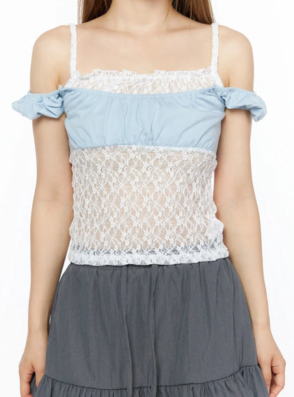 Lace Panel Cami Top CL501 Light blue close-up front shot on model showing square neckline, sheer floral lace midriff panel and off-shoulder ruffle sleeves