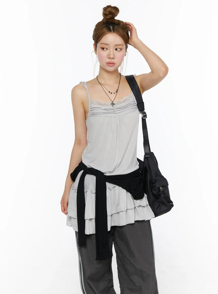 LEWKIN Lace Ruffle Mini Dress CL501 Gray S/M styled shot model wearing lace trim cami with tiered ruffle hem, black jacket tied at waist, crossbody bag