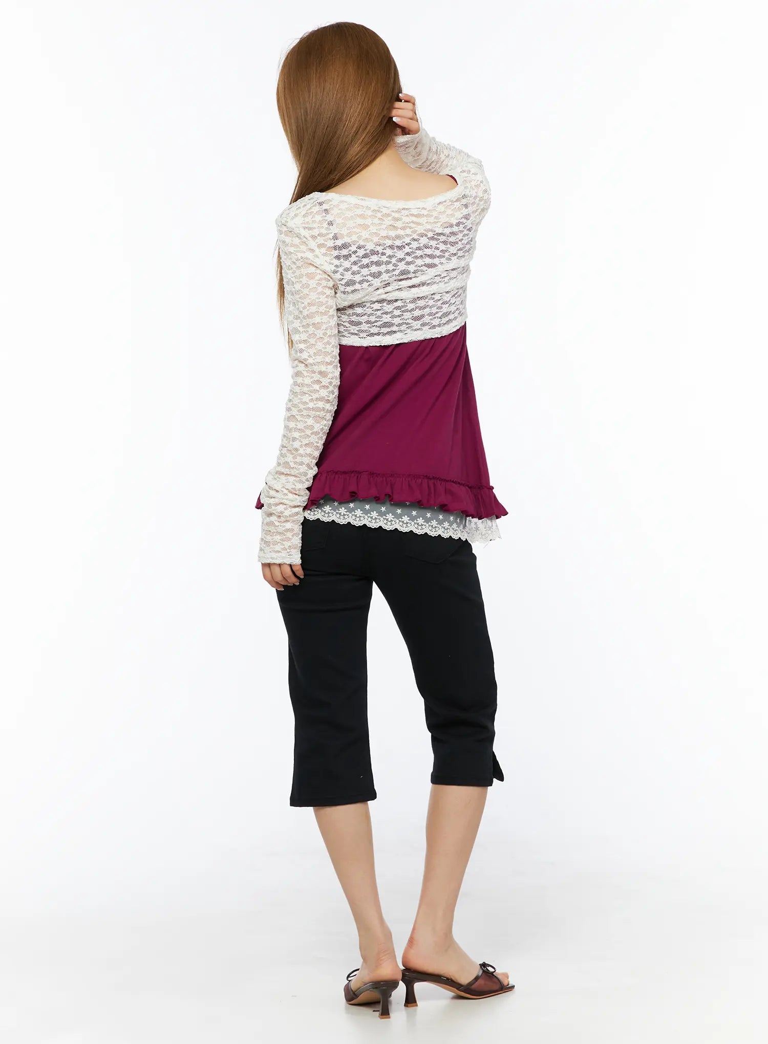 Lace Sheer Crop Cardigan CL502 White back shot on model showing sheer lace panel across shoulders and back over magenta ruffle-hem cami with floral lace trim