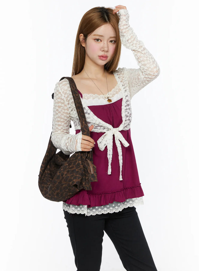 LEWKIN Lace Sheer Crop Cardigan CL502 White S/M front shot on model styled over magenta cami with lace bow tie and ruffle hem, carrying leopard bag