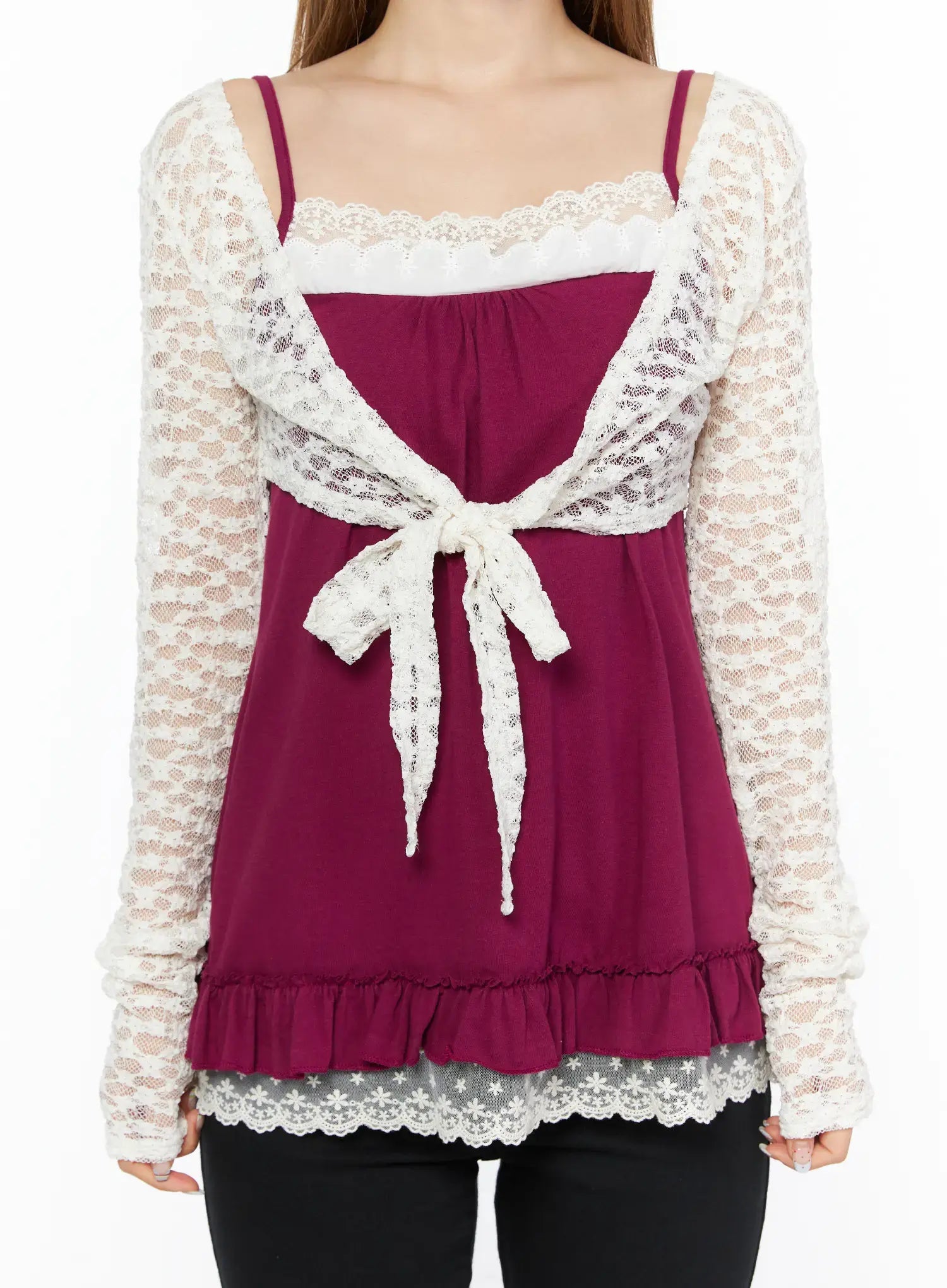 Lace Sheer Crop Cardigan CL502 White close-up front detail shot showing lace bow tie closure, scallop lace trim neckline and sheer floral lace sleeves over magenta cami