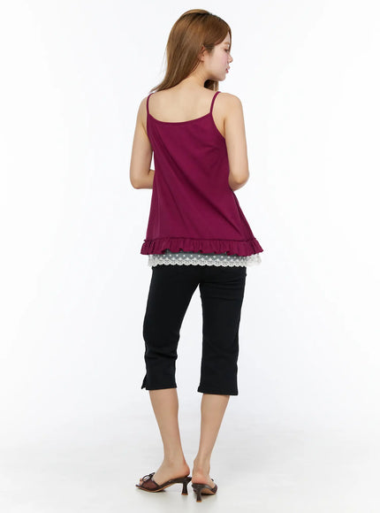 Lace Trim Cami Top CL502 Dark red full-length back view on model showing spaghetti straps, ruffle hem and lace trim, black cropped pants