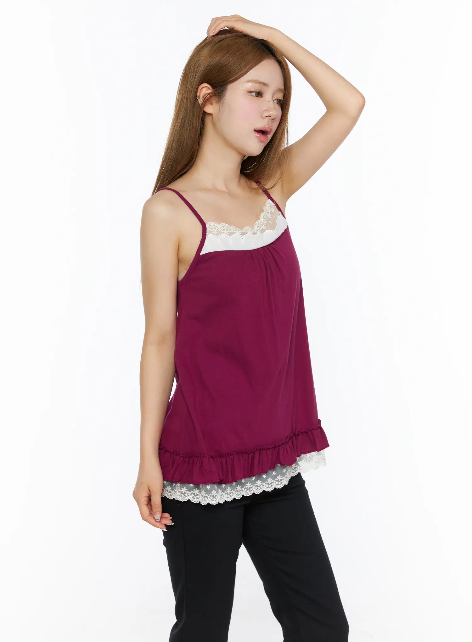 Lace Trim Cami Top CL502 Dark red side view on model with hand on head, white lace chest detail and ruffle lace hem visible, black pants