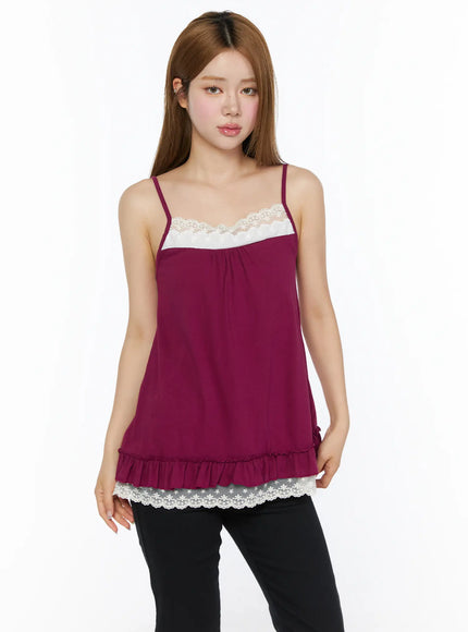 LEWKIN Lace Trim Cami Top CL502 Dark red front view on model wearing black pants, white lace chest panel and ruffle lace hem detail, S/M