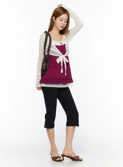 Lace Trim Cami Top CL502 Dark red front styling view on model with white lace shrug tied at waist, necklace and bag accessory, cropped pants