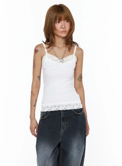 LEWKIN Lace Trim Cami Top CL503 White front view on model wearing ribbed cami with floral lace V-neckline and lace hem, styled with dark wide-leg jeans