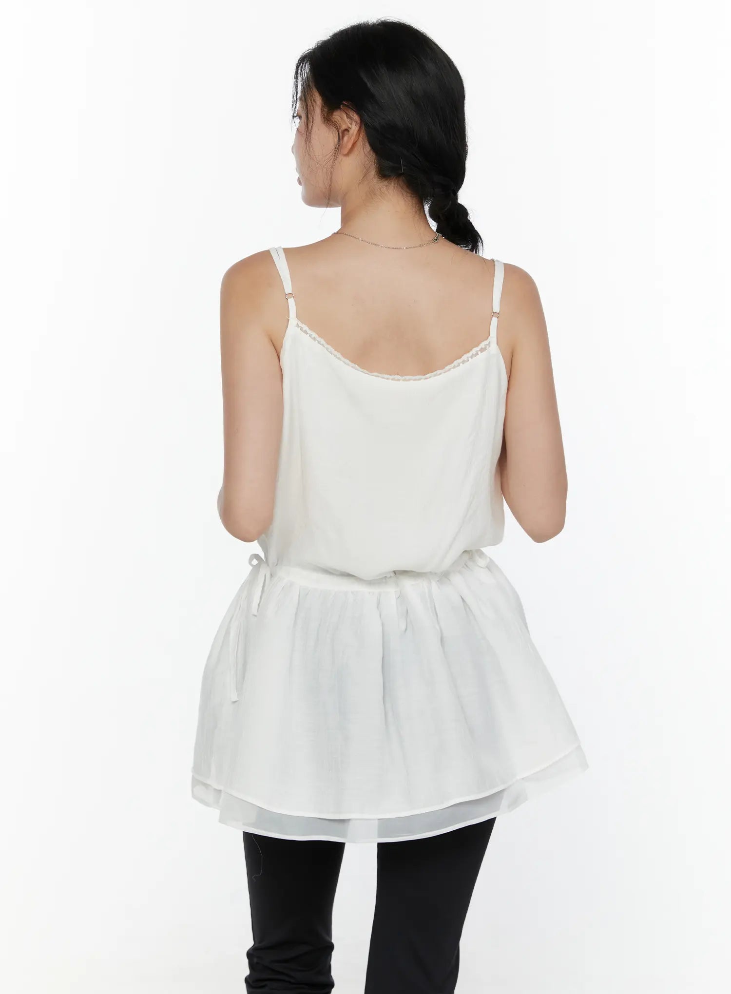 Lace Trim Cami Top CL520 White back view on model with braided hair showing lace trim back neckline adjustable spaghetti straps drawstring waist and flared layered hem