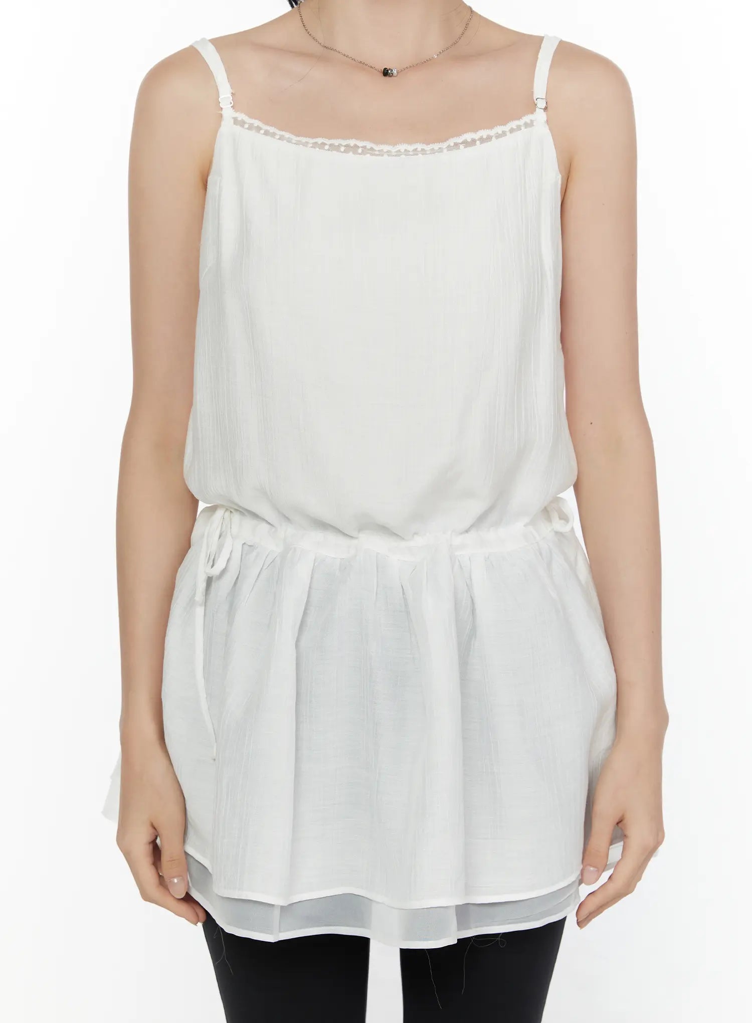 Lace Trim Cami Top CL520 White close-up front torso shot on model showing lace neckline trim adjustable spaghetti straps and crinkle chiffon fabric texture