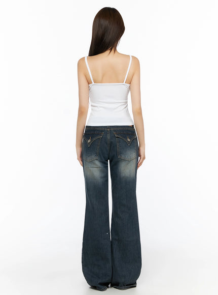 Lace Trim Cami Top IL523 White back shot on model showing clean open back, thin spaghetti straps, ribbed fabric, paired with low-rise flare jeans