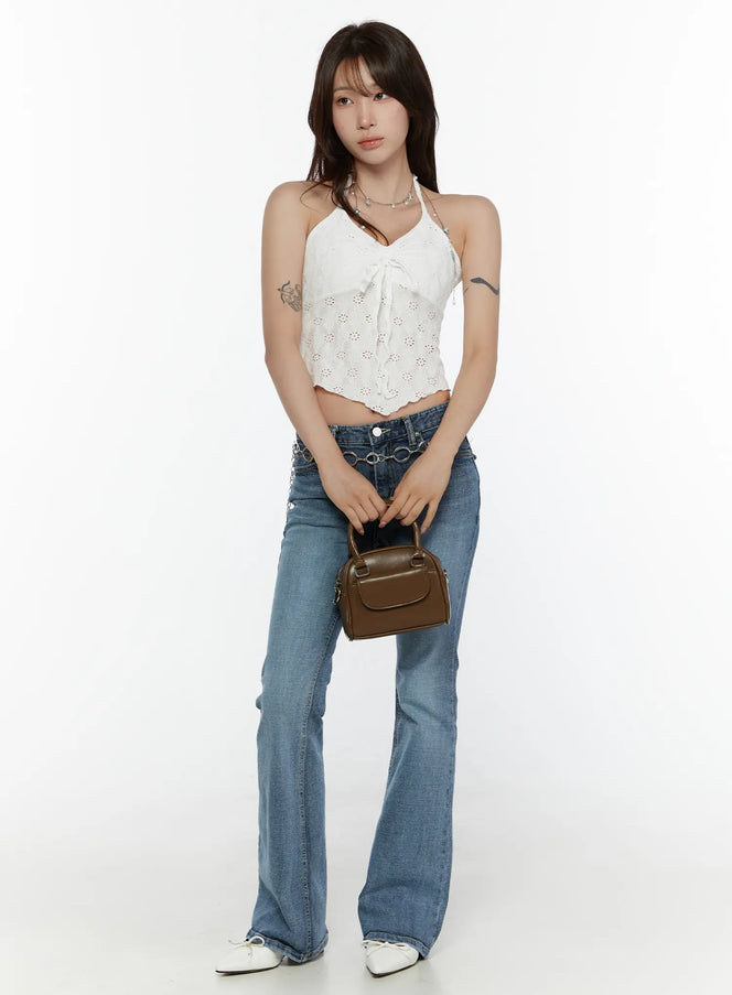 Lace Trim Halter Neck Cami CL508 White full-length front model shot standing upright holding brown mini bag paired with flare jeans and white flats