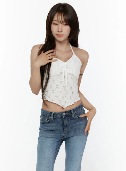 Lace Trim Halter Neck Cami CL508 White half-bust front model shot close-up showing eyelet lace floral pattern center ribbon tie and scallop hem with jeans