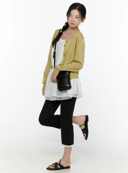 Lace Trim High-Waist Capri Pants CL520 Black full-body front styling shot on model with yellow cardigan white layered top black crossbody bag one leg raised