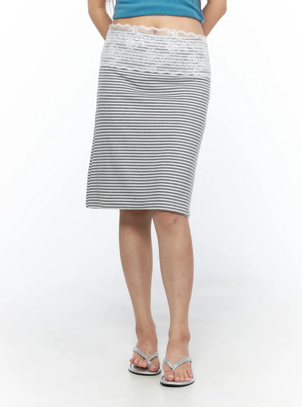 Lace Trim Midi Skirt CL517 Gray front close-up on model showing white lace waistband panel and gray-white stripe body with silver flip flops