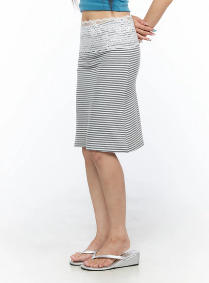 Lace Trim Midi Skirt CL517 Gray side view on model with hand on hip, white lace yoke detail and horizontal stripe midi length visible