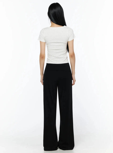 Lace Trim Polka Dot Top IL509 White back shot on model showing polka dot print, short sleeves, and clean back neckline with cropped hem
