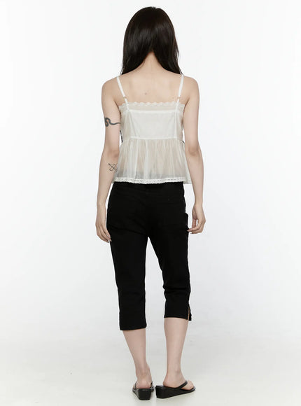 Lace Trim Tank IL521 White back shot on model showing adjustable spaghetti straps sheer peplum silhouette and eyelet lace hem trim