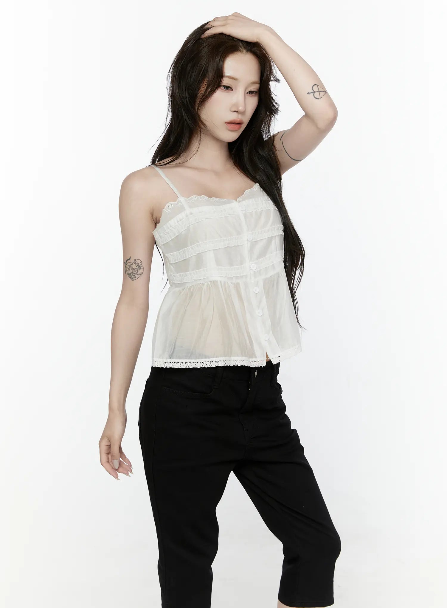 Lace Trim Tank IL521 White front shot on model hand raised to head showing lace neckline ruffle tiers button front and flowy sheer hem