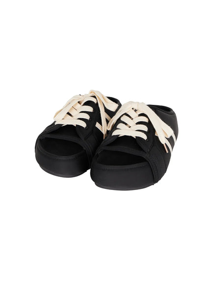 Lace-Up Slide Slippers CU530 Black three-quarter flat lay pair, showcasing open-toe sneaker-inspired mule with cream laces and stripe detailing
