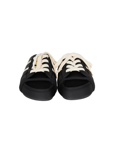 Lace-Up Slide Slippers CU530 Black front flat lay pair, highlighting open-toe platform silhouette with chunky cream lace-up and black upper