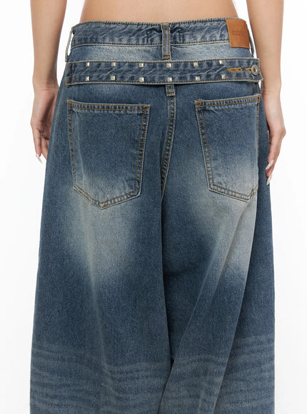 Lane Washed Wide Leg Jeans CU523 Blue close-up back detail showing square stud-trimmed waistband, leather brand patch, dual back pockets, and washed denim