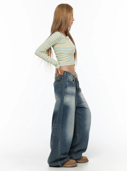 Lane Washed Wide Leg Jeans CU523 Blue side view on model in striped crop top, showcasing extreme wide-leg volume, washed fading, and low-rise fit