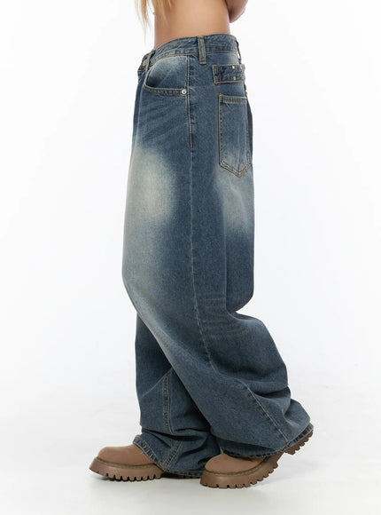 Lane Washed Wide Leg Jeans CU523 Blue side close-up on model showing studded belt loop detail, side pocket, and washed indigo denim texture