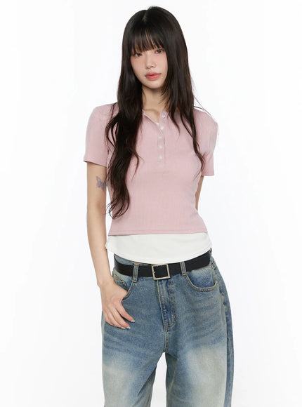Layered Henley Short Sleeve Tee CL523 pink front shot on model standing straight, ribbed crop top with white underlayer and button detail styled with jeans
