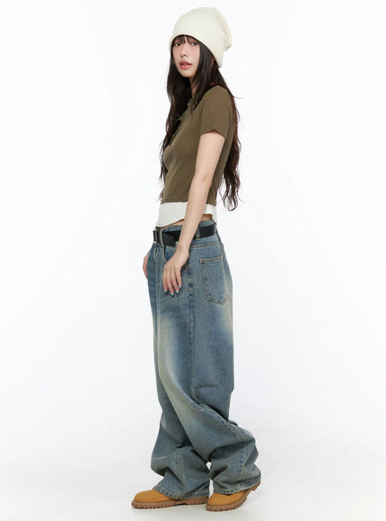 Layered Henley Short Sleeve Tee CL523 Dark green side shot on model showing ribbed texture, cropped silhouette with white underlayer peeking at hem