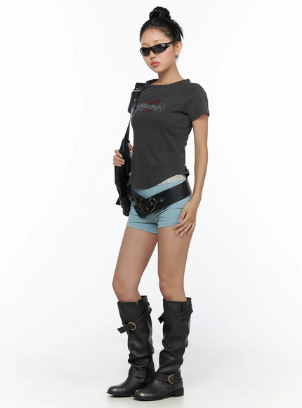 Layered Lace Shorts CL510 blue front full-body shot on model in biker-style outfit with graphic tee belt bag sunglasses and knee-high boots
