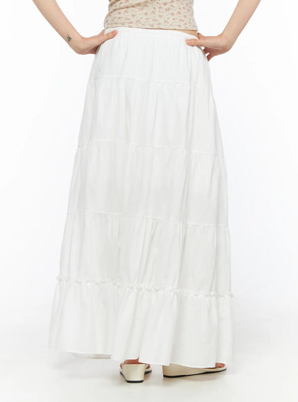 Layered Maxi Skirt CU530 white back close-up shot on model with hands on hips revealing elastic waistband and four-tier panel construction