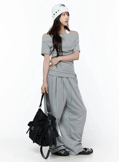 LEWKIN Layered Off-Shoulder Halter Top IL506 Gray S/M full-body front shot on model styled with matching wide-leg pants, beanie, and black backpack