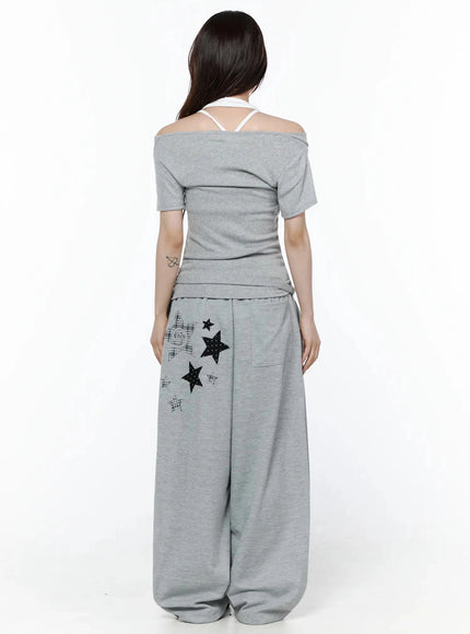 Layered Off-Shoulder Halter Top IL506 Gray back shot on model revealing clean back, off-shoulder drape, white halter strap, and star-patch pants