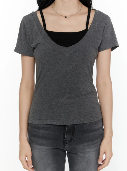 Layered Short Sleeve Tee CL521 Dark gray front detail close-up shot on model torso highlighting V-neckline black square-neck cami layer and heathered fabric texture