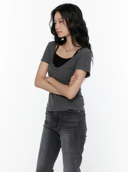 Layered Short Sleeve Tee CL521 Dark gray three-quarter side shot on model with arms crossed showing side profile V-neckline and fitted heathered fabric