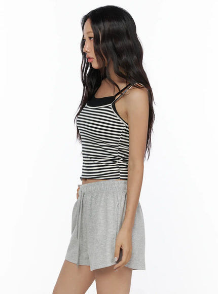 Layered Striped Cami Top CL513 Black side profile view on model showing layered double straps stripe texture and cropped hem with gray shorts