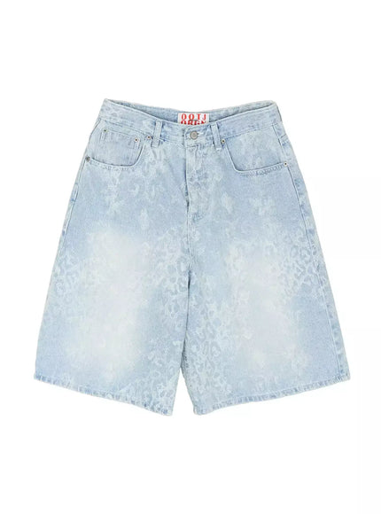 Leopard Print Jorts IU525 Light blue flat-lay front view showing full garment silhouette wide leg cut front pockets and tonal leopard jacquard washed denim