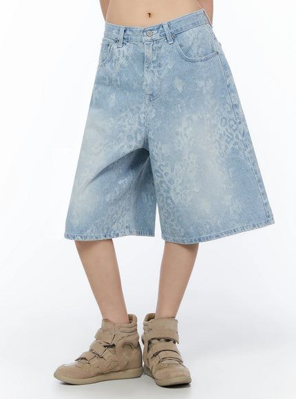 Leopard Print Jorts IU525 Light blue front close-up on model showing wide A-line leg opening tonal leopard print wash and silver rivets with chunky sneakers