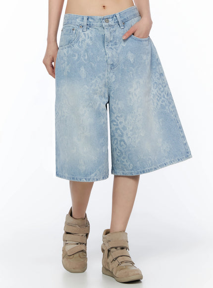 Leopard Print Jorts IU525 Light blue front close-up on model hand in front pocket highlighting wide leg cut tonal leopard print and mid-rise waistband detail