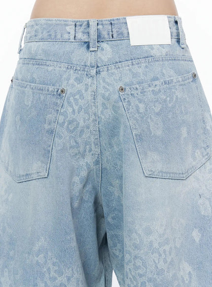 Leopard Print Jorts IU525 Light blue close-up detail of back waistband two patch pockets silver rivets white brand label and all-over leopard jacquard texture