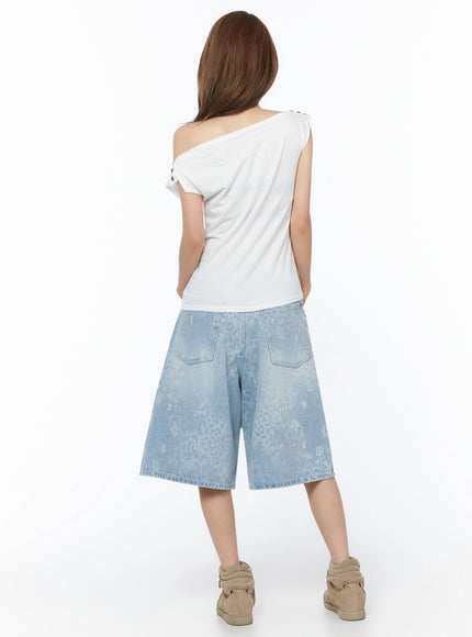Leopard Print Jorts IU525 Light blue back full-body view on model with white off-shoulder top showing rear patch pockets and all-over leopard jacquard denim