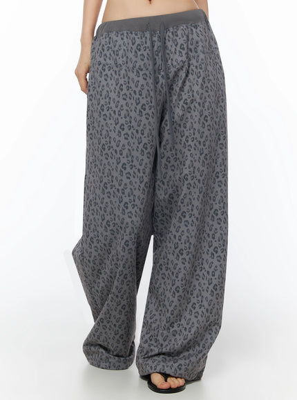 Leopard Print Wide-Leg Sweatpants IU525 Dark gray front lower-body shot on model showing wide-leg silhouette with gathered hem pooling at feet