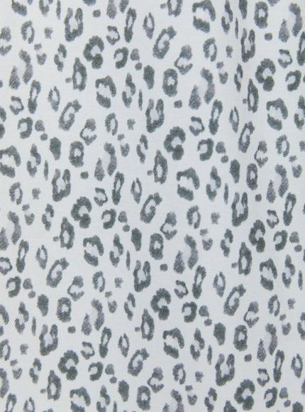 Leopard Print Wide-Leg Sweatpants IU525 Light gray close-up fabric texture shot showing brushed cotton leopard spot print in gray on white base