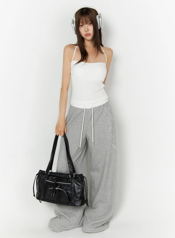 Lettering Contrast Waist Sweatpants IL515 Gray full-body front on model styled with white halter top, headphones, and black leather tote bag, standing pose