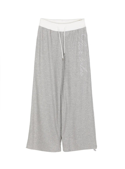 Lettering Contrast Waist Sweatpants IL515 Gray flat-lay front view showing full pant silhouette, white contrast waistband, white drawstring, and star-dot script graphic on wide leg